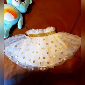 5 For $10 Little White Tutu with Gold Polka Dots.